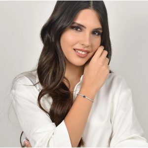 BRACCIALE DONNA IN ACCIAIO CON CRISTALLI BIANCHI E CUORE CRISTALLO BLU