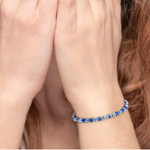 Bracciale con rondelle in pietra ed elementi in ematite